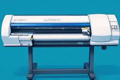Large-format vinyl printer and cutter producing custom stickers
