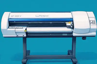 Large-format vinyl printer and cutter producing custom stickers
